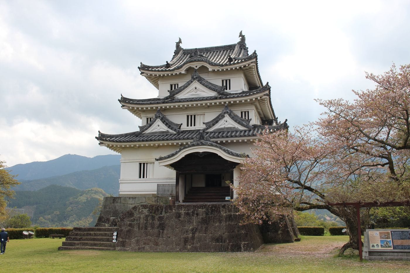 Capture of Uwajima Castle during spring with cherry blossoms in Japan.