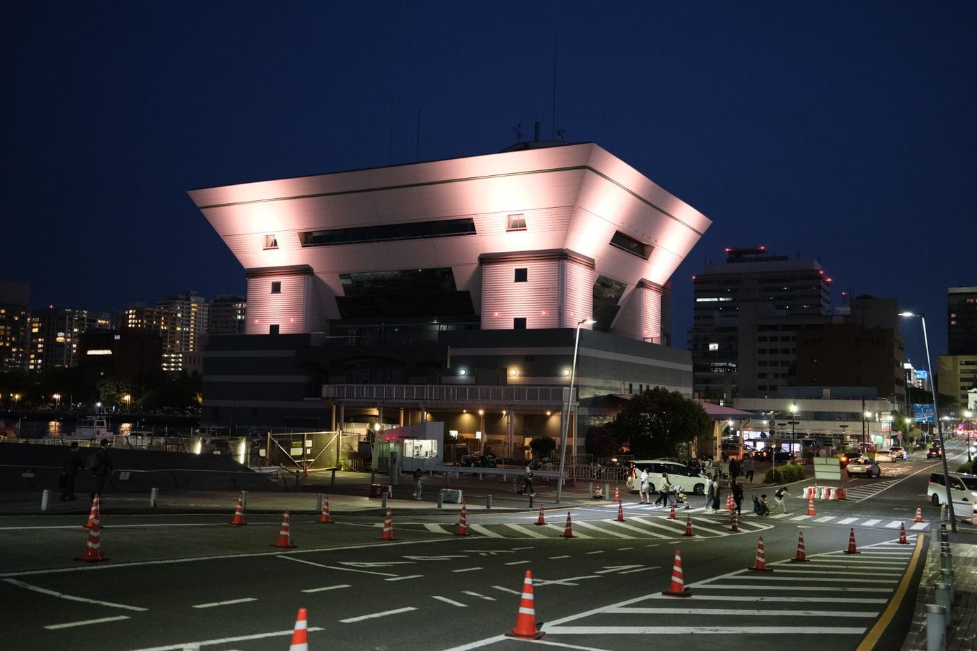 A stunning night view of the illuminated Osanbashi Pier Terminal in Yokohama, Japan.