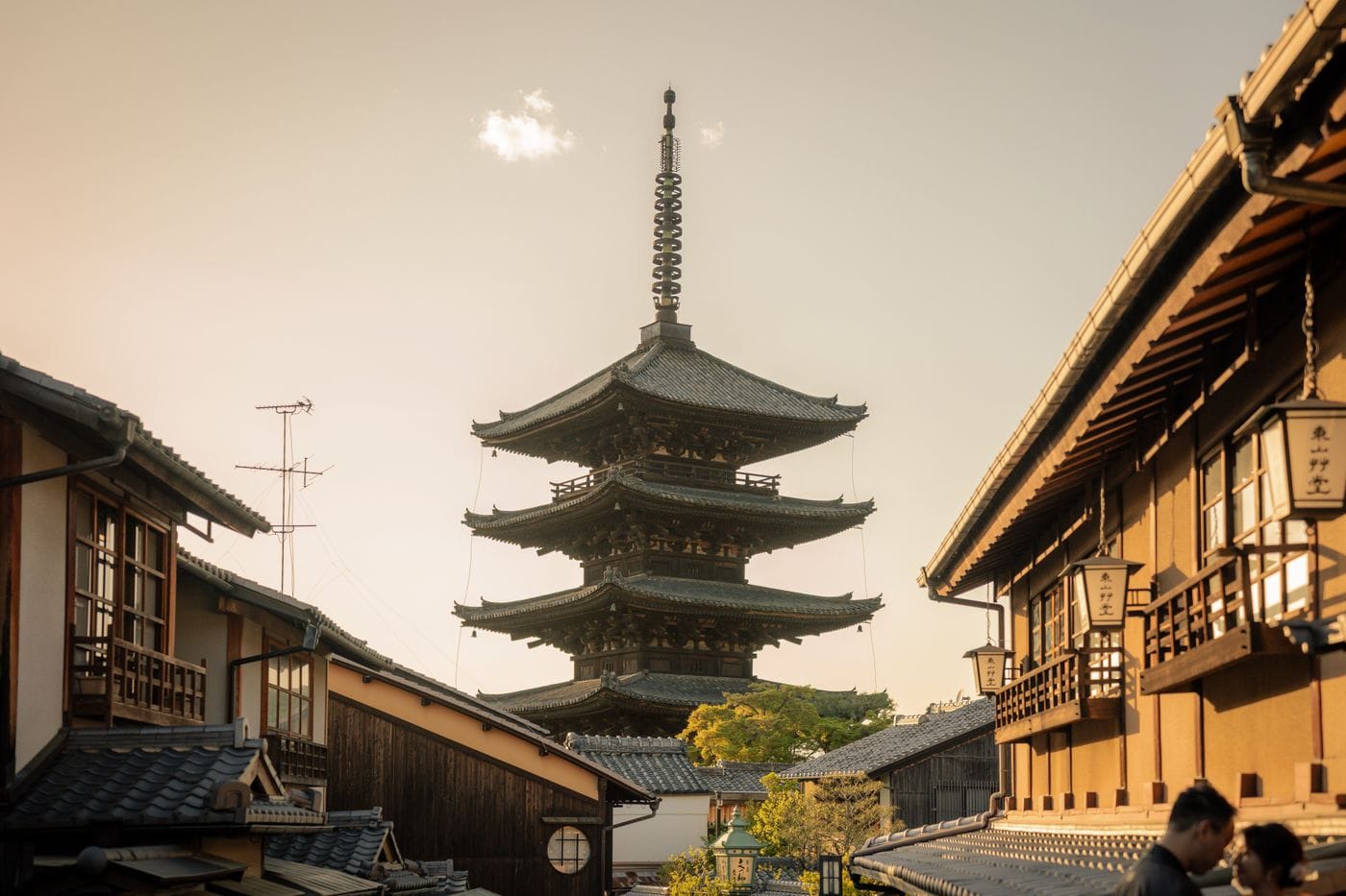 Scenic view of Yasaka Pagoda surrounded by traditional Kyoto architecture at sunset.